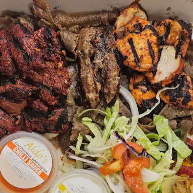 Sizzling Kebabs with sauce and salad served at Aldo's Fish bar Broxburn